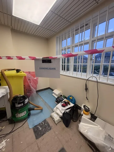 Asbestos floor tile and bitumen removal in Deptford